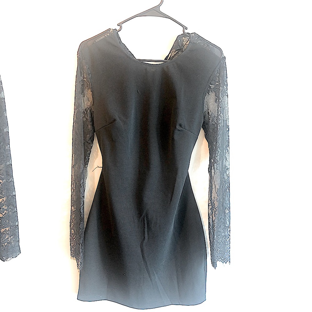 Black long lace sleeve dress with sexy Backless lower back moment size 4